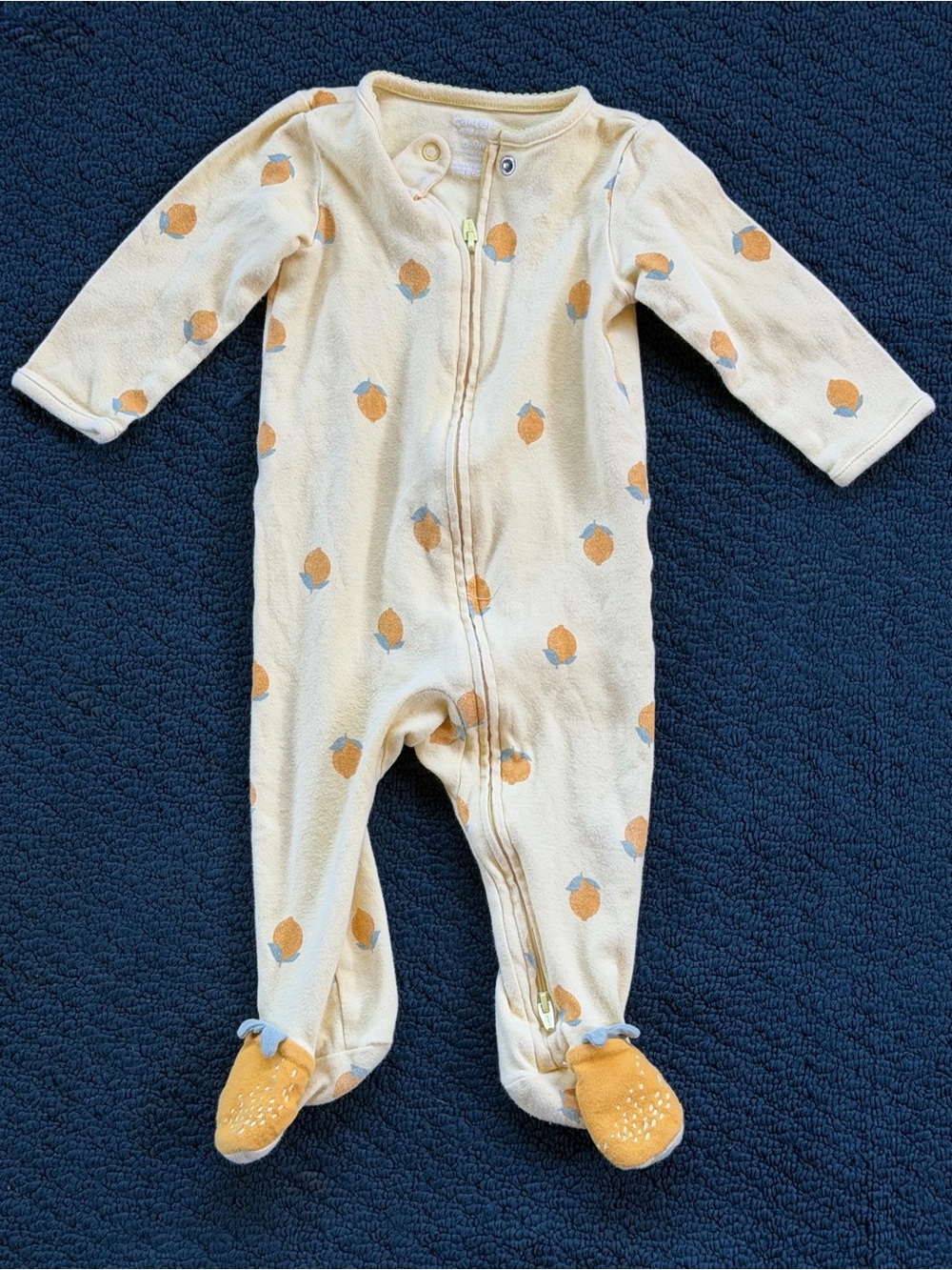 Carter's Cream One-Piece Footed Zipper Sleeper with Orange Fruit Motif